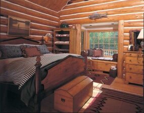 A Woodsy Retreat Cabin Decor Idea Taking Logs To New Heights