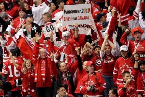 Canada fans cheer on their team during the ice hockey men's gold medal game in Vancouver between the USA and Canada -- which Canada won.