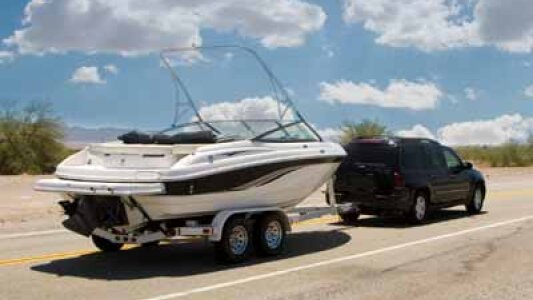 toy truck pulling boat