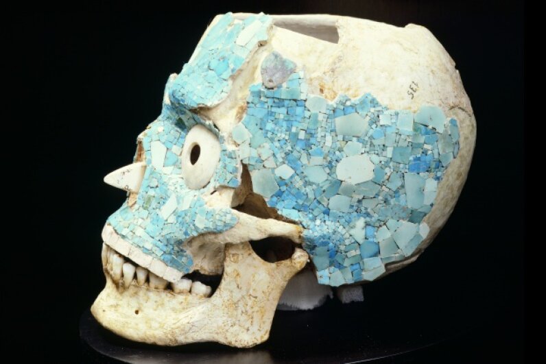 A skull decorated with turquoise salvaged from the treasury of Tomb 7 in Monte Alban, Mexico, now rests at the Museo De Las Culturas De Oaxaca. Caso was integral to discovering and excavating the tomb. DeAgostini/Getty Images
