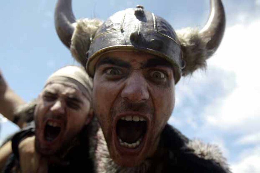 Men dressed up (rather inaccurately) as Vikings take part in the annual Viking festival of Catoira in north-western Spain. © MIGUEL VIDAL/Reuters/Corbis